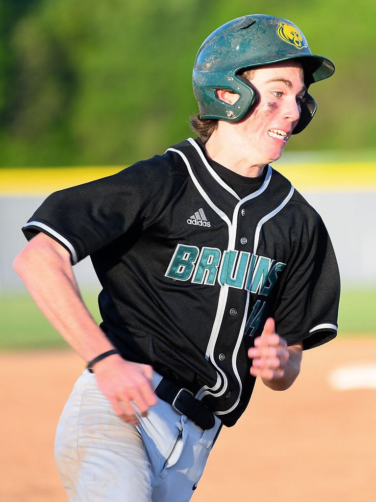 Elliot Bachrach rounds third base and races toward home plate